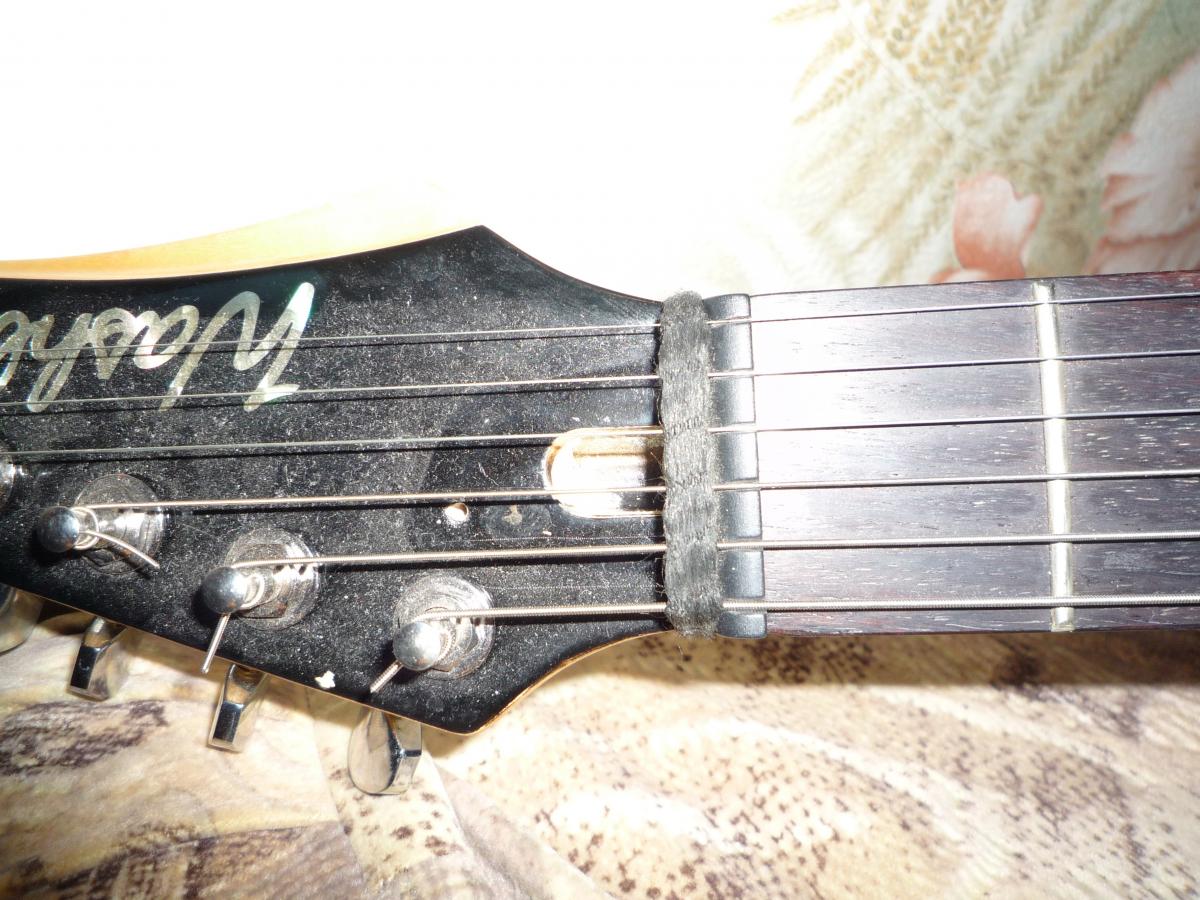 Резинка на гриф гитары